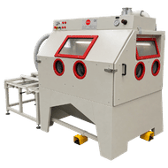 FEVI industrial sandblasting cabinet with front operator station, additional side operator station and loading trolley